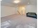 Bonus room with vaulted ceiling and a couch at 2716 Manor Stone Way, Indian Trail, NC 28079