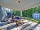 Relaxing stone patio with seating area and covered porch at 2716 Manor Stone Way, Indian Trail, NC 28079