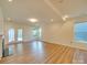 Large living area with hardwood floors and backyard access at 2716 Manor Stone Way, Indian Trail, NC 28079