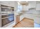 Modern kitchen with stainless steel appliances and farmhouse sink at 2716 Manor Stone Way, Indian Trail, NC 28079