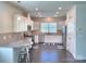 Spacious kitchen with granite countertops and stainless steel appliances at 16835 Cozy Cove Rd, Charlotte, NC 28278