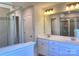 Double vanity bathroom with a large shower at 16835 Cozy Cove Rd, Charlotte, NC 28278