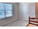 Well-lit bedroom with a window and closet at 16835 Cozy Cove Rd, Charlotte, NC 28278