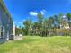 Spacious backyard with grassy area and room for outdoor activities at 16835 Cozy Cove Rd, Charlotte, NC 28278