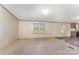 Bright living room with neutral walls and wood-look flooring at 408 Silk And Tassel Row, Cleveland, NC 27013