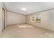 Spacious bedroom with neutral walls and carpet flooring at 408 Silk And Tassel Row, Cleveland, NC 27013