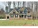 Two story house with brick and siding exterior at 8605 Carly Ln, Mint Hill, NC 28227