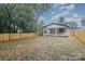 House with backyard and wooden privacy fence at 2305 Sanders Ave, Charlotte, NC 28216