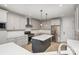 Modern kitchen with stainless steel appliances and an island at 2305 Sanders Ave, Charlotte, NC 28216