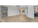 Spacious living room with hardwood floors and a fireplace at 2305 Sanders Ave, Charlotte, NC 28216