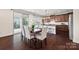 Kitchen dining area with hardwood floors and sliding glass doors to the backyard at 764 Garrett Green Way, Fort Mill, SC 29715