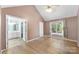 Bright bedroom with hardwood floors and access to a full bathroom at 308 Cape Breton Trl # 30, Gastonia, NC 28056