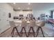 Modern kitchen with island and stainless steel appliances at 13111 Cottage Crest Ln, Charlotte, NC 28273