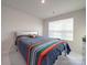 Bedroom with a queen-size bed and window coverings at 13111 Cottage Crest Ln, Charlotte, NC 28273
