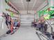 Garage with overhead storage, and plenty of space for tools and equipment at 13111 Cottage Crest Ln, Charlotte, NC 28273
