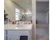 Bathroom with a vanity, large mirror, and an adjacent shower at 13111 Cottage Crest Ln, Charlotte, NC 28273