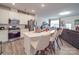 Modern kitchen with island and stainless steel appliances at 13111 Cottage Crest Ln, Charlotte, NC 28273