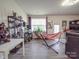Relaxing living room with a hammock and large TV at 13111 Cottage Crest Ln, Charlotte, NC 28273