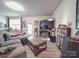 Finished basement with sectional sofa, large TV, and home gym at 13111 Cottage Crest Ln, Charlotte, NC 28273