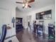 Game room with TV, storage, and sports decor at 1517 Kimberly Rd, Charlotte, NC 28208