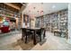 Spacious living room showcasing a red couch and built-in bookshelves at 310 Arlington Ave # Multiple, Charlotte, NC 28203
