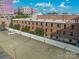 Brick building with ample parking and urban surroundings at 310 Arlington Ave # Multiple, Charlotte, NC 28203