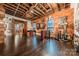 Open living area with exposed brick and spiral staircase at 310 Arlington Ave # Multiple, Charlotte, NC 28203