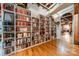 Expansive library with floor-to-ceiling bookshelves at 310 Arlington Ave # Multiple, Charlotte, NC 28203