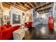 Sophisticated living room with red armchairs and unique decor at 310 Arlington Ave # Multiple, Charlotte, NC 28203