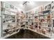 White bookcases filled with various books and decor at 310 Arlington Ave # Multiple, Charlotte, NC 28203