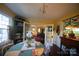 Formal dining room with a charming table setting and view to living room at 292 Mocksville Hwy, Statesville, NC 28625