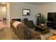 Living Room with brown reclining sofas and a large TV at 4016 Holly Villa Cir, Indian Trail, NC 28079