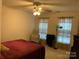 Cozy bedroom with a queen-size bed and window at 4016 Holly Villa Cir, Indian Trail, NC 28079