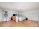Bedroom with double bed and wood floors at 12137 Renee Ford Rd, Stanfield, NC 28163