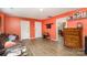 Living room with brown couch and wood floors at 12137 Renee Ford Rd, Stanfield, NC 28163
