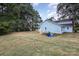 Blue house exterior with large backyard and mature trees at 12137 Renee Ford Rd, Stanfield, NC 28163