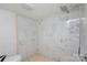 Clean bathroom with a shower and marble tile at 12137 Renee Ford Rd, Stanfield, NC 28163