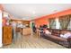 Open concept kitchen and living area with hardwood floors at 12137 Renee Ford Rd, Stanfield, NC 28163