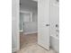 Bathroom with a tub and access to another room at 4021 Puddle Pond Rd # 657, Indian Trail, NC 28079