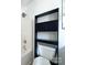 Bathroom with a toilet and a dark wood cabinet at 5115 Rosemede Dr, Charlotte, NC 28227