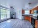 Kitchen with wood cabinets, stainless steel appliances, and vinyl flooring at 5115 Rosemede Dr, Charlotte, NC 28227
