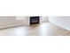 Living room featuring a fireplace and light wood floors at 515 Tates Trl # 39, Cramerton, NC 28032