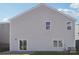 Rear view of house with grey siding, patio, and landscaping at 7914 Old Brook Rd, Sherrills Ford, NC 28673