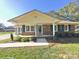 Brick ranch house with covered porch and landscaping at 1825 Bennett Rd, Lancaster, SC 29720