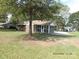 Ranch home with screened porch and mature trees at 1825 Bennett Rd, Lancaster, SC 29720