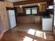 Kitchen with light-colored cabinets, laminate countertops, and white appliances at 142 Alsace St, Mount Holly, NC 28120