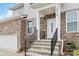 Modern front entrance with stone accents and steps at 1038 Heath Helms Rd, Monroe, NC 28110