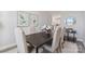 Dining room with table, chairs, and artwork, offering a bright and airy feel at 1038 Heath Helms Rd, Monroe, NC 28110