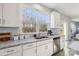 Kitchen boasts granite counters, white cabinets, and a sink at 1038 Heath Helms Rd, Monroe, NC 28110