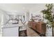 Open concept kitchen with granite island and hardwood floors at 1038 Heath Helms Rd, Monroe, NC 28110